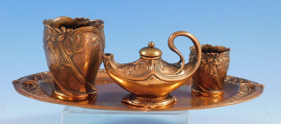 Gorham Art Nouveau Bronze 4-Piece Smoking Set: Gorham Art Nouveau Bronze 4-Piece Smoking Set This exquisite Gorham 4-piece Smoking Set showcases a stunning Art Nouveau design crafted from high-quality bronze. The set includes a cigarette holder, m
