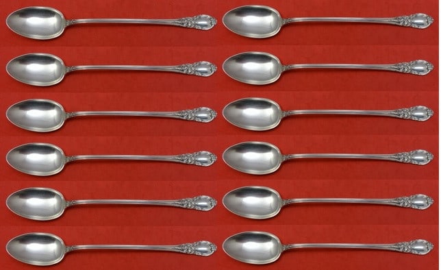 Lunt American Victorian Sterling Silver Iced Tea Spoon Set 12 Pieces 7 1/4": Lunt American Victorian Sterling Silver Iced Tea Spoon Set 12 Pieces 7 1/4" This exquisite set features 12 iced tea spoons, each measuring 7 1/4" long, designed in the elegant American Victorian patte