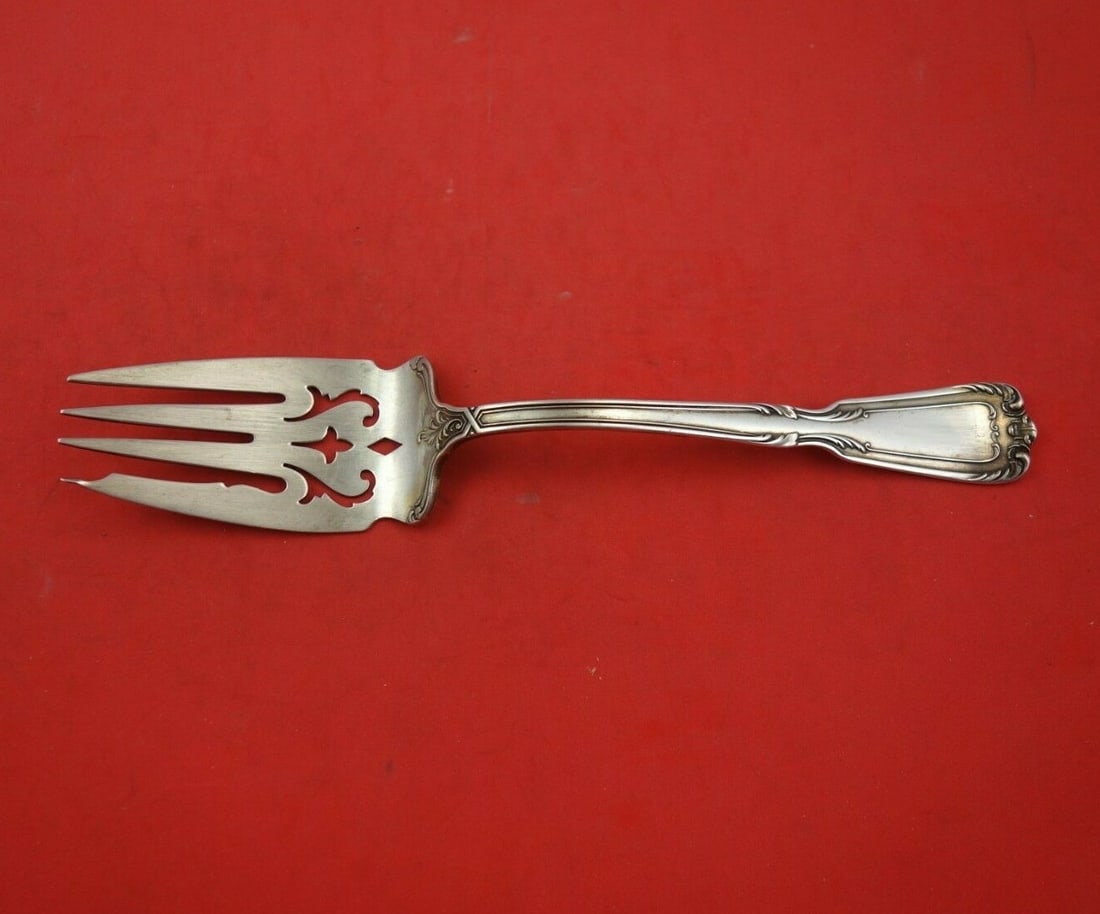 Reed and Barton Chambord Sterling Silver Cold Meat Fork 8 3/4": Reed and Barton Chambord Sterling Silver Cold Meat Fork 8 3/4" This exquisite Chambord cold meat fork, crafted by Reed and Barton, showcases a stunning pierced design. Made from high-quality sterling