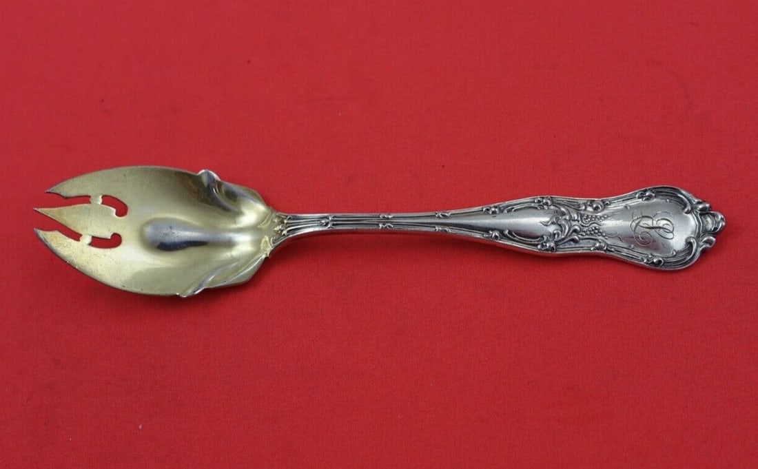 Shiebler Gothic Sterling Silver Ice Cream Fork Gold Washed 5 3/8": Shiebler Gothic Sterling Silver Ice Cream Fork Gold Washed 5 3/8" Indulge in a touch of elegance with this Gothic ice cream fork by Shiebler, crafted from high-quality sterling silver (.925). Measurin
