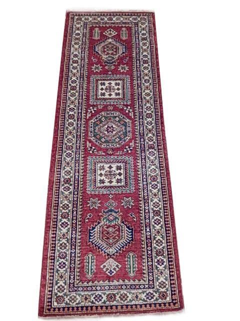 Handwoven 2.9 x 7.11 Red Kazak Rug Authentic Geometric Design: Handwoven 2.9 x 7.11 Red Kazak Rug Authentic Geometric Design Free continental US Shipping Transform your living space with this exquisite Red Super Handwoven Kazak Rug, measuring 2' 9" x 7' 11". This