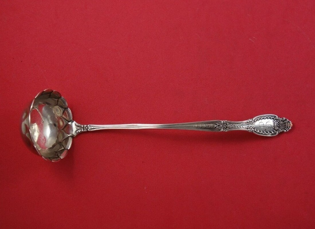 Tiffany and Co Richelieu Sterling Silver Cream Ladle Fancy Bowl 6 3/4": Tiffany and Co Richelieu Sterling Silver Cream Ladle Fancy Bowl 6 3/4" This exquisite cream ladle from the Richelieu pattern by Tiffany and Co. is crafted from high-quality sterling silver, showcasing