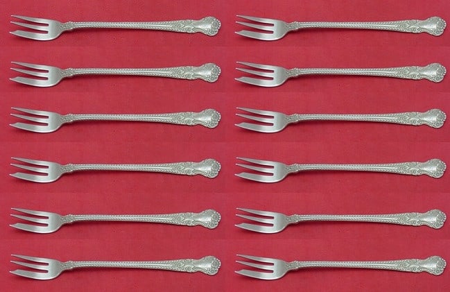 Gorham Cambridge Sterling Silver Cocktail Fork Set 12 Pieces 5 3/8": Gorham Cambridge Sterling Silver Cocktail Fork Set 12 Pieces 5 3/8" Elevate your dining experience with this exquisite 12-piece cocktail fork set from the renowned Gorham brand, featuring the elegant