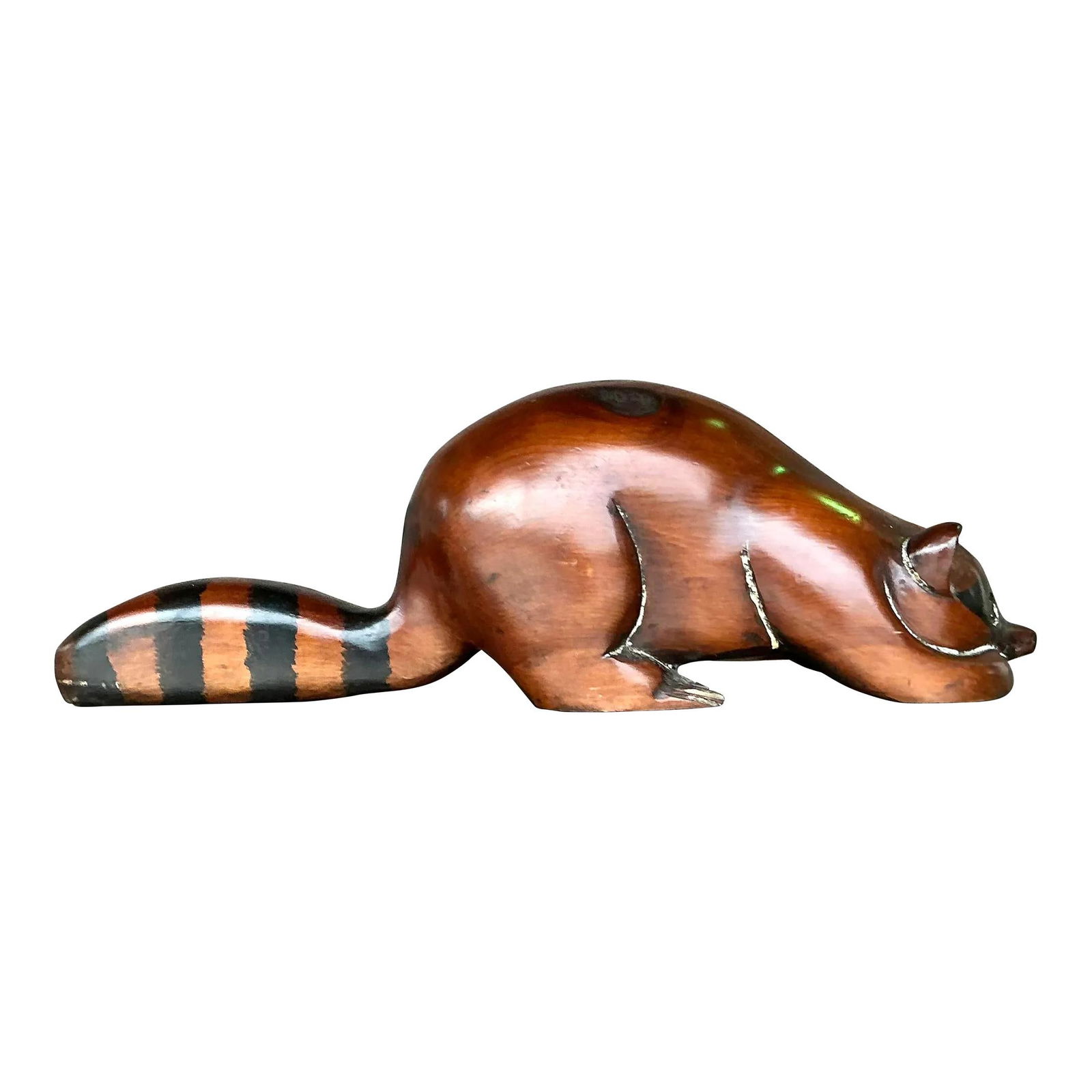 Vintage Boho Hand-Carved Wood Raccoon Sculpture 22" Long: Vintage Boho Hand-Carved Wood Raccoon Sculpture 22" Long Enhance your living space with this charming vintage boho carved wood raccoon. Expertly hand-carved, this decorative piece showcases intricate