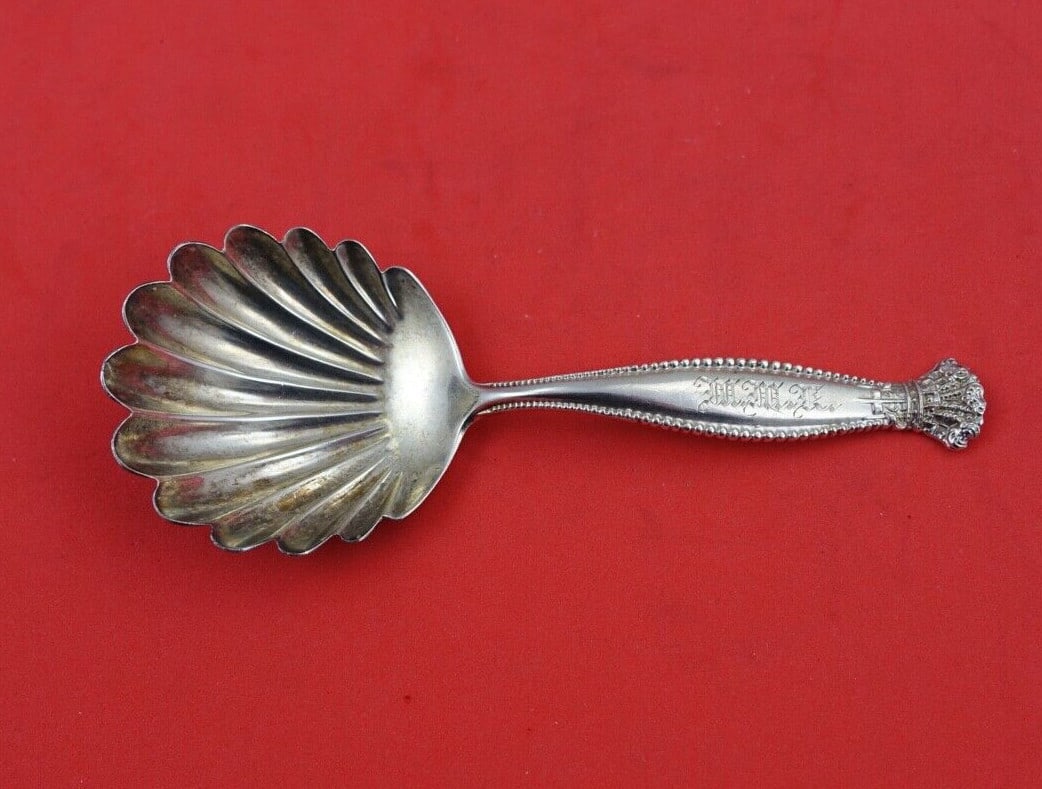 Shiebler Sandringham Sterling Silver Nut Spoon 4.5 Inch Serving: Shiebler Sandringham Sterling Silver Nut Spoon 4.5 Inch Serving This exquisite Sandringham nut spoon crafted by Shiebler features a stunning sterling silver composition, measuring 4 1/2" in length. Or