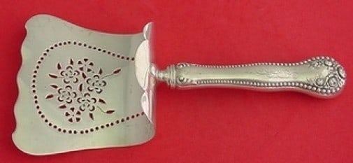 Gorham Lancaster Sterling Silver Pierced Asparagus Server 9 1/4": Gorham Lancaster Sterling Silver Pierced Asparagus Server 9 1/4" This exquisite asparagus server from the Lancaster pattern by Gorham is crafted from high-quality sterling silver. Featuring a hollow h