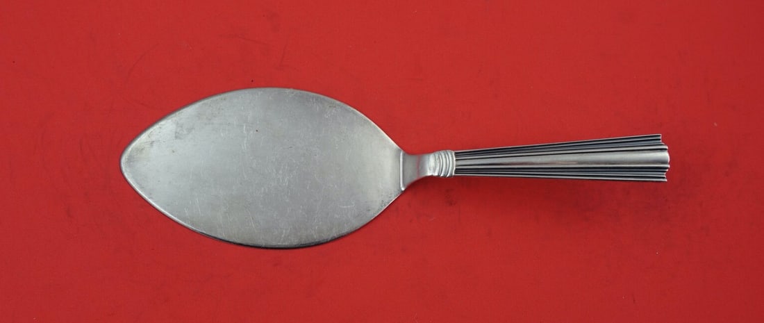 Carl F. Christiansen Danish Sterling Silver Pastry Server 7 5/8": Carl F. Christiansen Danish Sterling Silver Pastry Server 7 5/8" This Danish Sterling pastry server features a flat handle and is crafted from high-quality sterling silver. Made by Carl F. Christianse