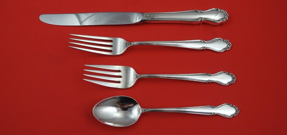 International Wedding Bells Sterling Silver 4-Piece Place Setting: International Wedding Bells Sterling Silver 4-Piece Place Setting Enhance your dining experience with this exquisite 4-piece place setting in the elegant Wedding Bells pattern by International. Crafte