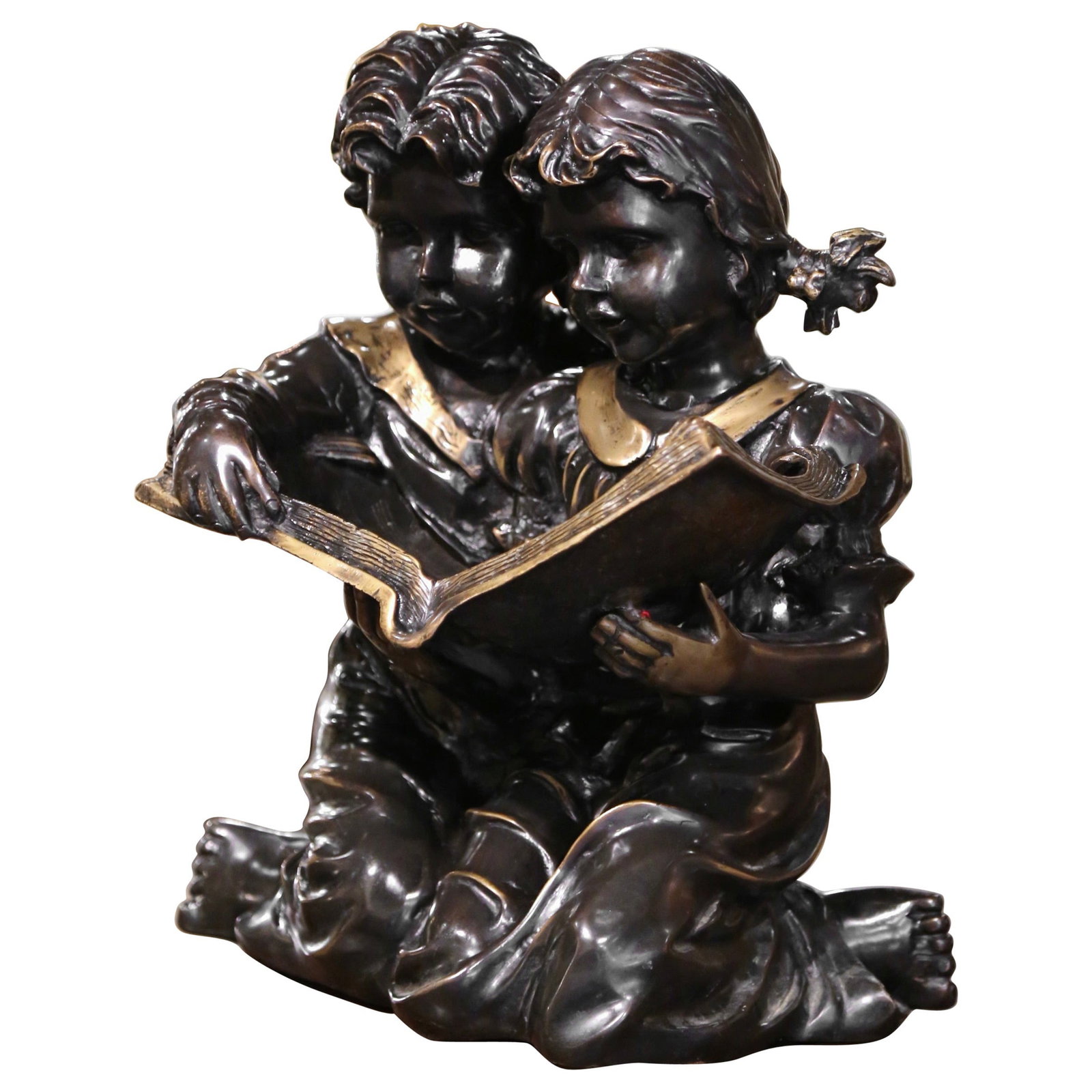 19th Century French Bronze Sculpture Children Reading Book Gilt Patinated: 19th Century French Bronze Sculpture Children Reading Book Gilt Patinated This exquisite 19th Century French two-tone bronze sculpture titled "Children Reading Book" captures a heartwarming scene of t