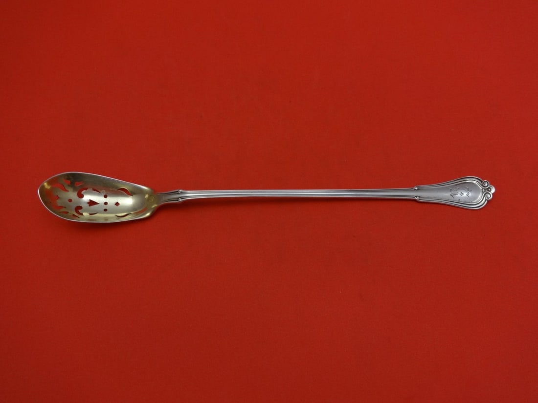 Gorham Villa Norfolk Sterling Silver Gold Washed Olive Spoon 8 1/4": Gorham Villa Norfolk Sterling Silver Gold Washed Olive Spoon 8 1/4" Elevate your dining experience with this exquisite Villa Norfolk Olive Spoon by Gorham. Crafted in sterling silver, this long servin