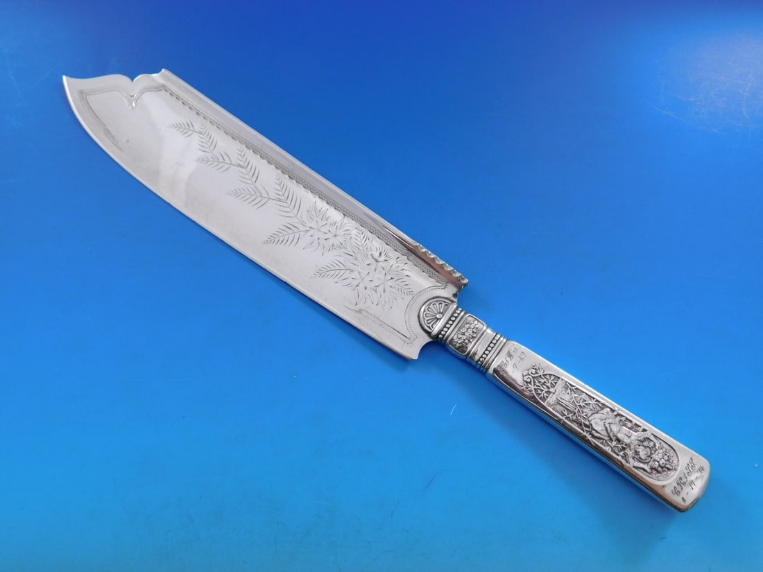 Gorham Fontainebleau Sterling Silver Ice Cream Slice 12" Multi-Motif Serving Piece: Gorham Fontainebleau Sterling Silver Ice Cream Slice 12" Multi-Motif Serving Piece Experience the elegance of the Fontainebleau pattern by Gorham with this exquisite sterling silver ice cream slice. F