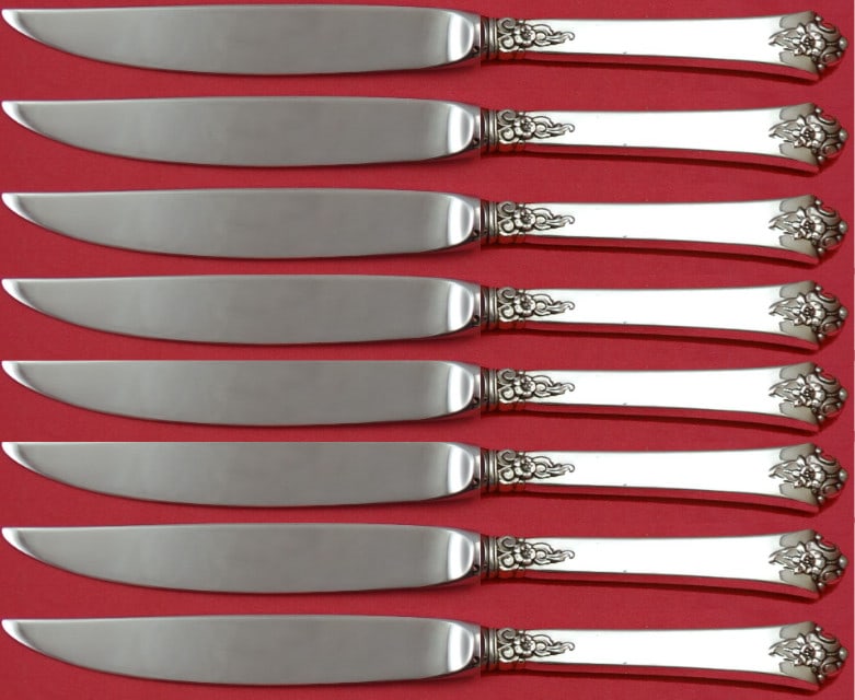 Royal Crest Castle Rose Sterling Silver Steak Knife Set 8pc: Royal Crest Castle Rose Sterling Silver Steak Knife Set 8pc This elegant set of 8 steak knives features a stunning Castle Rose pattern by Royal Crest. Crafted with an exquisite sterling silver hollow