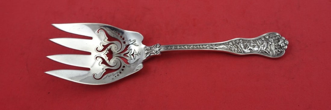 Tiffany & Co Olympian Sterling Silver Serving Fork 7.5" Pierced Design: Tiffany & Co Olympian Sterling Silver Serving Fork 7.5" Pierced Design Discover the elegance of this serving fork from the renowned Olympian pattern by Tiffany & Co. Crafted from sterling silver, this