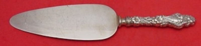 Lily Pattern Sterling Cake Server by Frank Whiting 10 Inch Silver Plate Blade: Lily Pattern Sterling Cake Server by Frank Whiting 10 Inch Silver Plate Blade This cake server features a sterling silver hollow handle and a silver plated blade in the Lily pattern by Frank M. Whitin