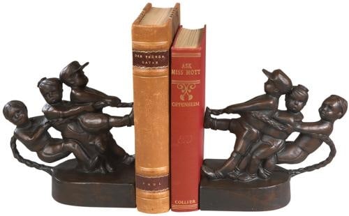 Vintage Style Tug of War Bookends Hand-Cast Resin Decor: Vintage Style Tug of War Bookends Hand-Cast Resin Decor Enhance your vintage decor with these charming Tug of War bookends, expertly crafted to provide both functionality and artistic flair. These boo