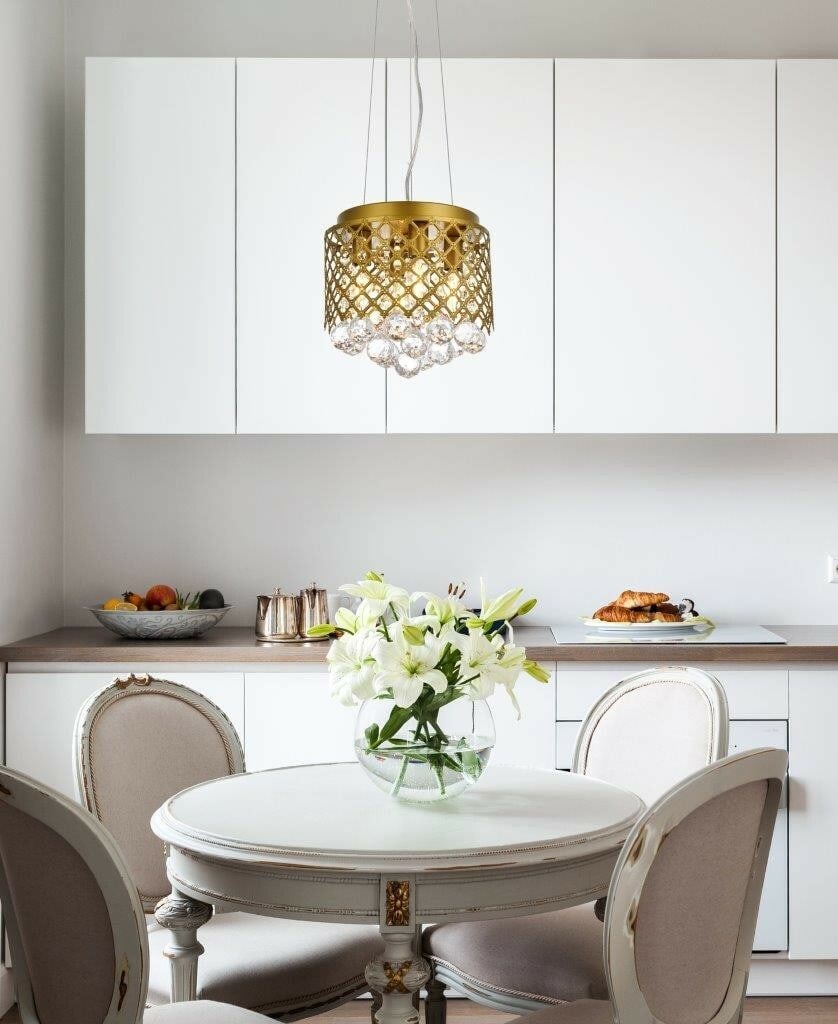 Living District Tully 4-Light Brass Crystal Pendant Chandelier for Dining or Kitchen: Living District Tully 4-Light Brass Crystal Pendant Chandelier for Dining or Kitchen This modern pendant chandelier features four lights and a striking round design with crystal glass and iron constru