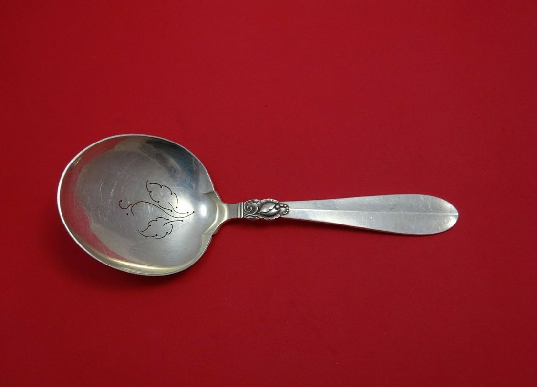 Frigast Princess Fuchsia Sterling Silver Pierced Spoon 9 Inch: Frigast Princess Fuchsia Sterling Silver Pierced Spoon 9 Inch This elegant serving spoon from the Princess Fuchsia pattern by Frigast is crafted from high-quality sterling silver. Measuring 9 inches i