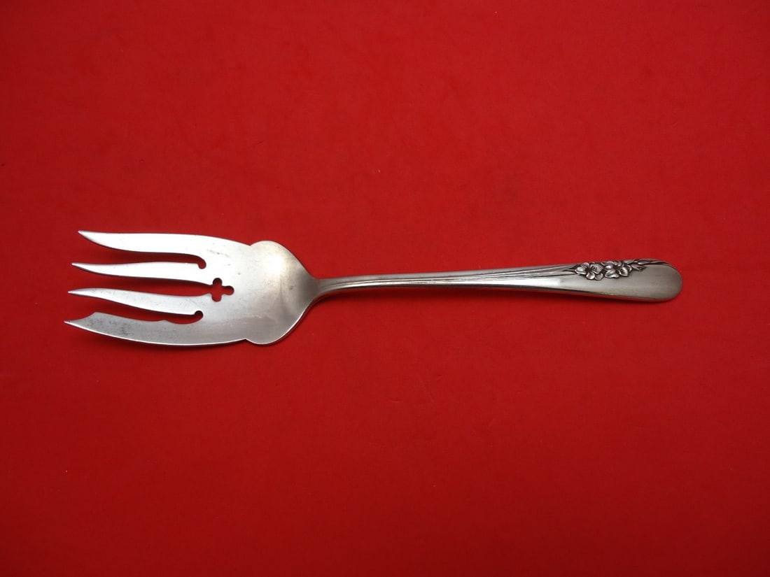 International Sterling Silver Blossom Time Cold Meat Fork 7 5/8": International Sterling Silver Blossom Time Cold Meat Fork 7 5/8" This exquisite serving fork from International Sterling, featuring the elegant Blossom Time pattern, is ideal for serving cold meats. C