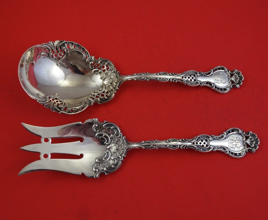 Durgin Regent Sterling Silver Salad Serving Set 2pc Pierced 9 3/4": Durgin Regent Sterling Silver Salad Serving Set 2pc Pierced 9 3/4" Enhance your dining experience with this exquisite 2-piece salad serving set from the Regent pattern by Durgin. Crafted from high-qua
