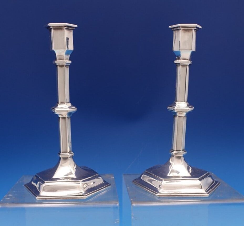 Victorian Sterling Silver Candlestick Pair by William Hutton & Sons: Victorian Sterling Silver Candlestick Pair by William Hutton & Sons This exquisite pair of English Victorian candlesticks, crafted by William Hutton & Sons, showcases the elegance of the 19th century.