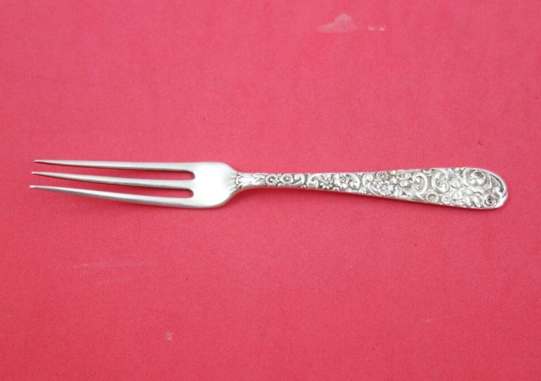 Jacobi & Jenkins Sterling Silver Repousse Strawberry Fork 5 1/8": Jacobi & Jenkins Sterling Silver Repousse Strawberry Fork 5 1/8" This exquisite strawberry fork features the elegant Repousse pattern by Jacobi & Jenkins, crafted from high-quality sterling silver. Me