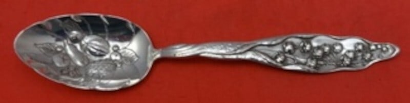 Whiting Sterling Silver Serving Spoon Lily of the Valley Hand Chased Fruit 8.25": Whiting Sterling Silver Serving Spoon Lily of the Valley Hand Chased Fruit 8.25" This exquisite serving spoon features the elegant "Lily of the Valley" pattern by Whiting, crafted from sterling silver