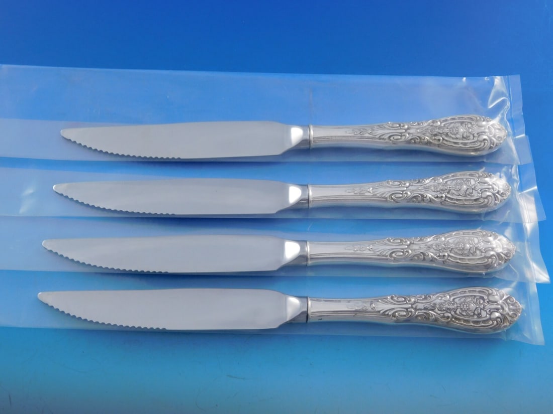 Easterling Southern Grandeur Sterling Silver Steak Knife Set 4pc Custom: Easterling Southern Grandeur Sterling Silver Steak Knife Set 4pc Custom Enhance your dining experience with the Southern Grandeur Sterling Silver Steak Knife Set by Easterling. This exquisite 4-piece