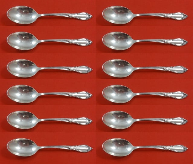 International Sterling Silver Rhapsody New Teaspoon Set of 12 pcs 6 inch: International Sterling Silver Rhapsody New Teaspoon Set of 12 pcs 6 inch This exquisite set of 12 teaspoons from the Rhapsody New pattern by International Sterling is a perfect addition to your flatwa