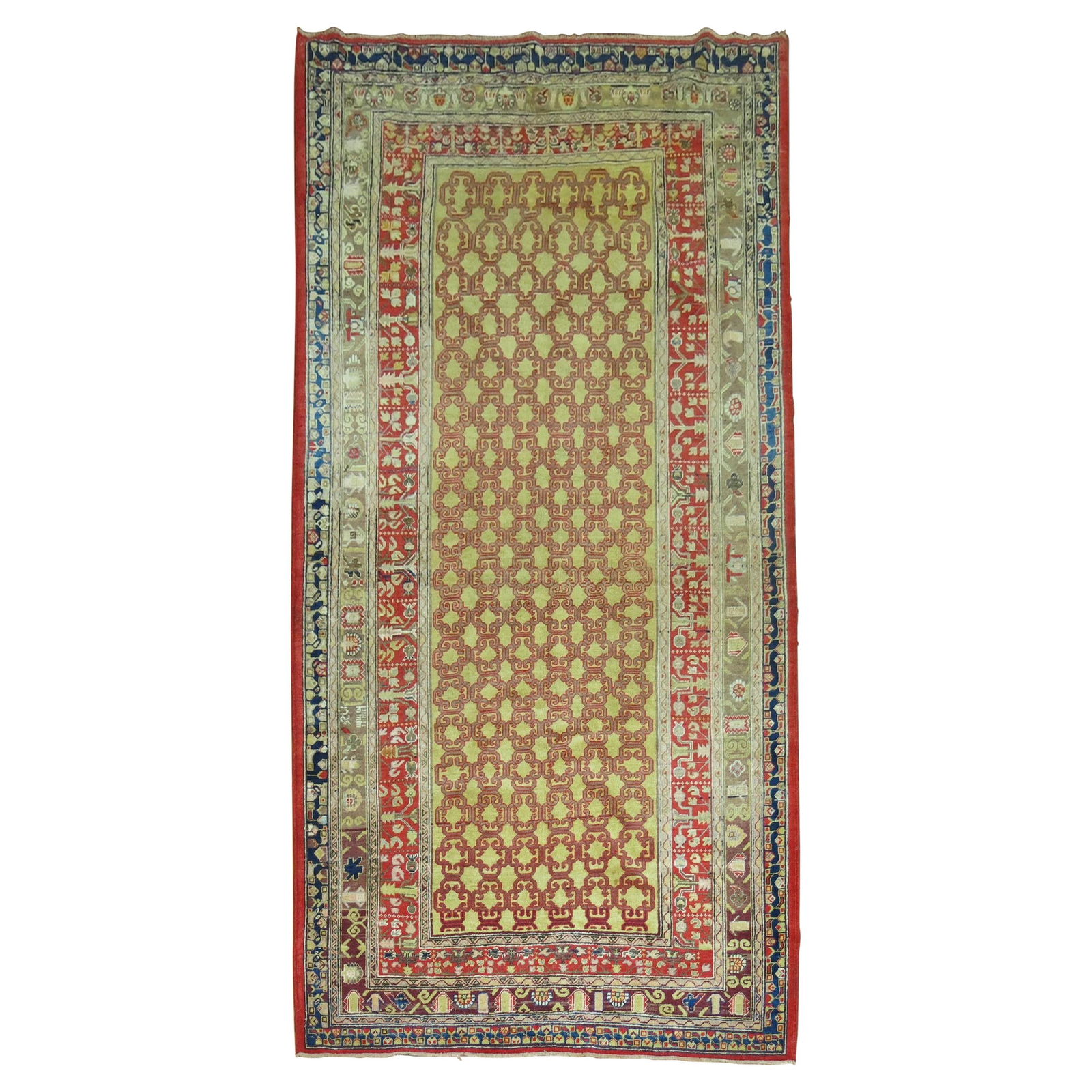 East Turkestan Khotan Wool Rug Mid 20th Century Samarkand Style 4'4" x 9'1": East Turkestan Khotan Wool Rug Mid 20th Century Samarkand Style 4'4" x 9'1" This vibrant mid-century Samarkand rug from East Turkestan features a Chinoiserie style and was crafted circa 1940. Made fro