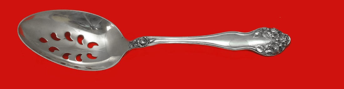 Watson Sterling Silver Wedding Rose 9-Hole Slotted Serving Spoon: Watson Sterling Silver Wedding Rose 9-Hole Slotted Serving Spoon This exquisite serving spoon features the elegant Wedding Rose pattern by Watson, crafted from high-quality sterling silver. The slotte