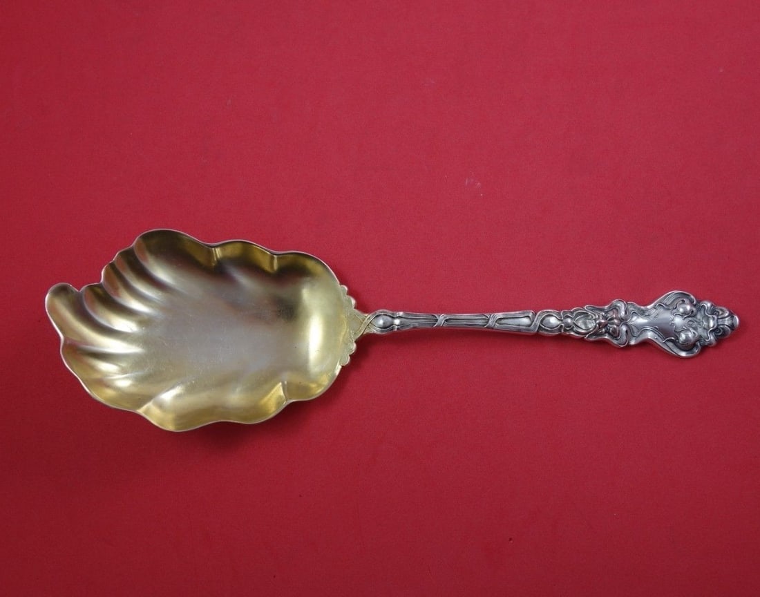 Unger Douvaine Sterling Silver Gold Washed Pudding Spoon 9 1/4": Unger Douvaine Sterling Silver Gold Washed Pudding Spoon 9 1/4" This exquisite Douvaine pudding spoon by Unger showcases the elegance of the early 20th century. Crafted from high-quality sterling silv