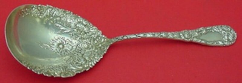 Durgin Chrysanthemum Sterling Silver Berry Spoon 9 1/4 Inch: Durgin Chrysanthemum Sterling Silver Berry Spoon 9 1/4 Inch This exquisite berry spoon features the iconic Chrysanthemum pattern by Durgin, crafted from high-quality sterling silver. Measuring 9 1/4 i