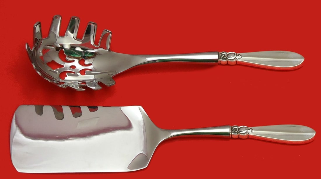 Frigast Princess Fuchsia Sterling Silver Pasta Server Set 2pc: Frigast Princess Fuchsia Sterling Silver Pasta Server Set 2pc Enhance your dining experience with this exquisite Princess Fuchsia by Frigast Sterling Italian Pasta Server Set. This elegant hostess set