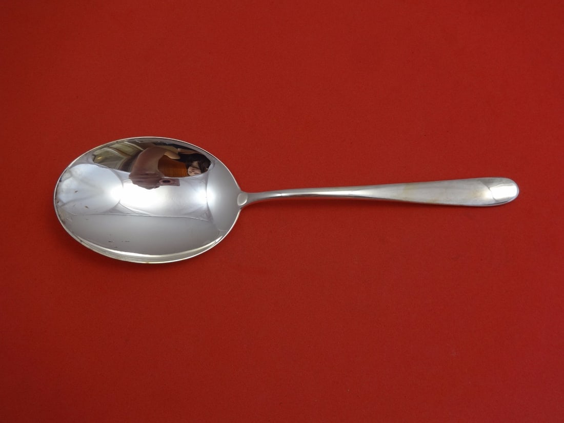 Zaramella Argenti Svedeze Sterling Silver Rice Spoon 11 1/8": Zaramella Argenti Svedeze Sterling Silver Rice Spoon 11 1/8" This exquisite rice spoon is crafted from high-quality sterling silver by renowned maker Zaramella Argenti. Featuring a flat handle, this s