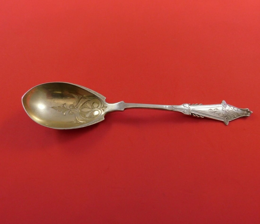 Knowles & Ladd Coral Sterling Silver Preserve Spoon Gold Washed 7 1/4": Knowles & Ladd Coral Sterling Silver Preserve Spoon Gold Washed 7 1/4" This exquisite preserve spoon, crafted by Knowles & Ladd, features a stunning bright-cut design in the Coral pattern. Made of ste