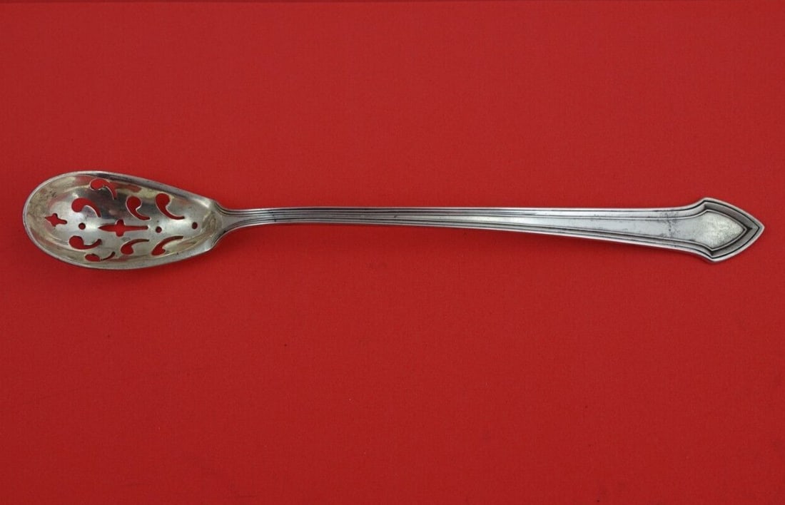 Durgin Essex Sterling Silver Pierced Olive Spoon 8 1/2" Vintage: Durgin Essex Sterling Silver Pierced Olive Spoon 8 1/2" Vintage This exquisite Essex by Durgin sterling silver olive spoon is a must-have for collectors and enthusiasts of vintage tableware. Crafted b
