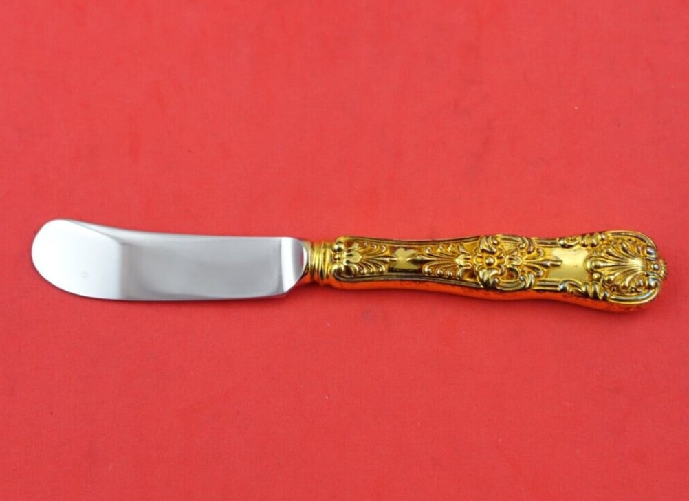 Tiffany & Co English King Vermeil Sterling Silver Butter Spreader 5 3/4 Inch: Tiffany & Co English King Vermeil Sterling Silver Butter Spreader 5 3/4 Inch This elegant butter spreader features the distinguished English King Vermeil pattern by Tiffany & Co. Crafted from sterling