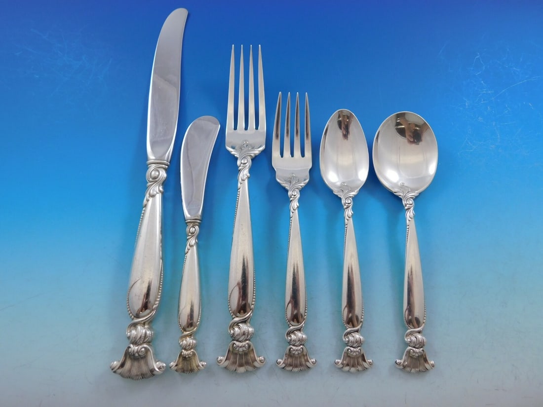 Wallace Romance of the Sea Sterling Silver Flatware Set 72 Pc Shell Motif: Wallace Romance of the Sea Sterling Silver Flatware Set 72 Pc Shell Motif Experience the elegance of dining with the Romance of the Sea Sterling Silver Flatware Set by Wallace. This exquisite 72-piece