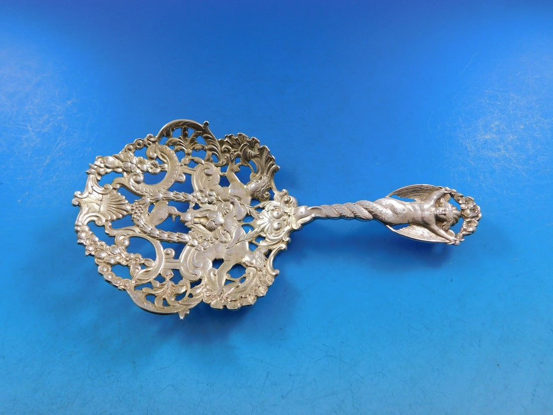 Gorham Sterling Silver Spoon Number 592 Art Nouveau Figural Angel Design: Gorham Sterling Silver Spoon Number 592 Art Nouveau Figural Angel Design Discover a stunning piece of history with this Gorham Sterling Silver Confection Spoon, featuring the intricate Pattern Number