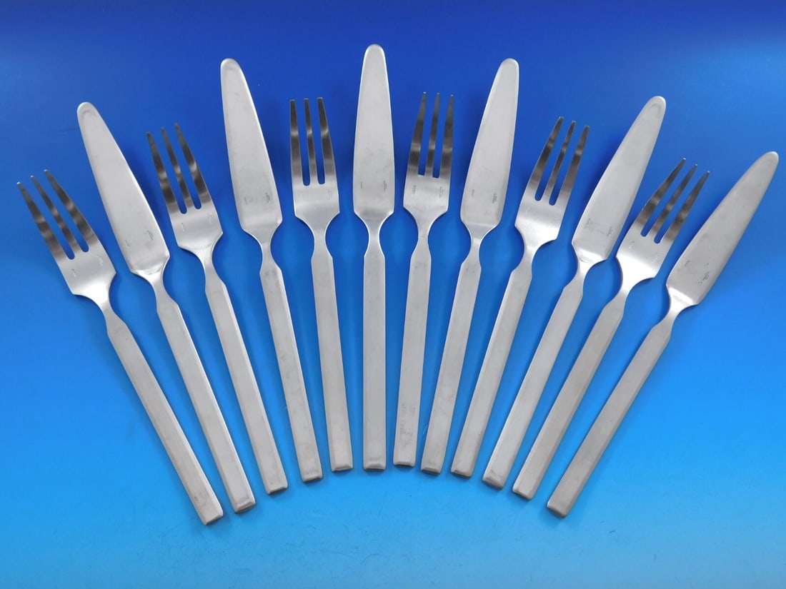 Christofle Gamma Stainless Steel 12-Piece Fish Flatware Set: Christofle Gamma Stainless Steel 12-Piece Fish Flatware Set Elevate your dining experience with the Gamma by Christofle France Stainless Steel Flatware Individual Fish Set. This exquisite 12-piece set