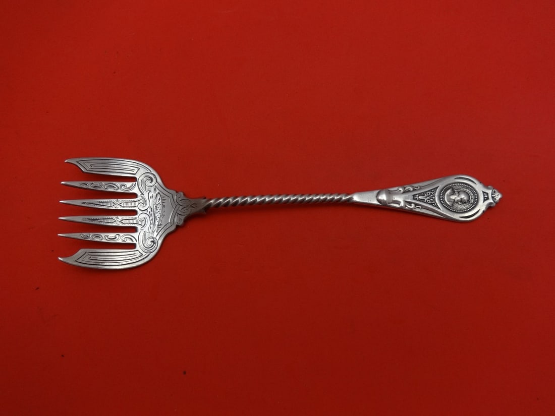 Albert Coles Medallion Sterling Silver Sardine Fork 6 1/4 Inch: Albert Coles Medallion Sterling Silver Sardine Fork 6 1/4 Inch This exquisite sardine fork, crafted by Albert Coles, is made from high-quality sterling silver and features a charming brite-cut design.