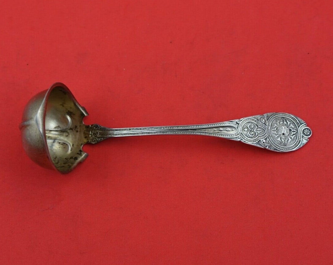 Wendt Moresque Sterling Silver Sauce Ladle Gold Washed 6 1/4 Inch: Wendt Moresque Sterling Silver Sauce Ladle Gold Washed 6 1/4 Inch This exquisite sauce ladle is crafted in sterling silver by Wendt, featuring the elegant Moresque pattern. The ladle boasts a gold-was