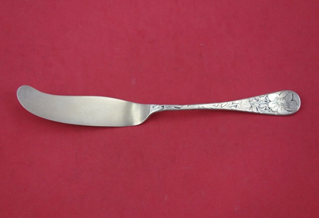 Tiffany & Co Acid Etched Sterling Silver Master Butter Knife 8 1/16": Tiffany & Co Acid Etched Sterling Silver Master Butter Knife 8 1/16" This exquisite master butter knife features a flat handle, acid etched design, and is crafted from sterling silver. The knife showc