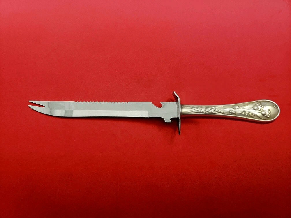 Lunt Quintessence Sterling Silver Ham Slicer Custom 11 1/2" Knife: Lunt Quintessence Sterling Silver Ham Slicer Custom 11 1/2" Knife This exquisite ham slicer from the Quintessence pattern by Lunt showcases a beautiful sterling silver hollow handle paired with a dura