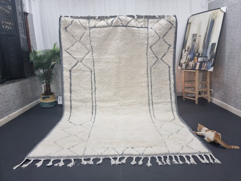 Artistic Handwoven Soft White Rug 100% Wool from Morocco 10 x 6.56 Feet: Artistic Handwoven Soft White Rug 100% Wool from Morocco 10 x 6.56 Feet Elevate your living space with this Artistic Soft White Engraved Rug. Handwoven in the Atlas Mountains by skilled local Berber w