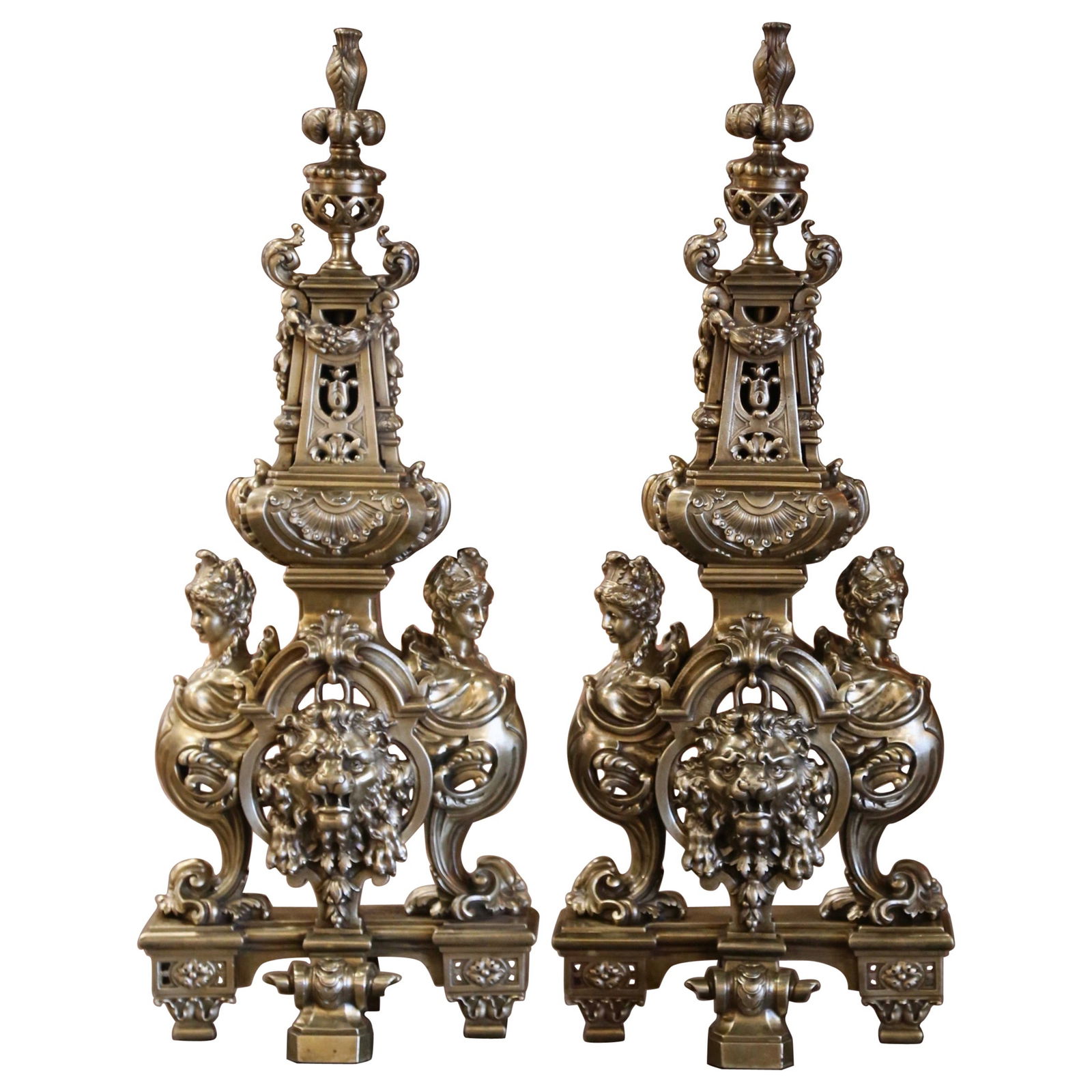 19th Century French Baroque Bronze Andirons Set with Lion and Goddess Figures: 19th Century French Baroque Bronze Andirons Set with Lion and Goddess Figures Enhance your fireplace with this exquisite pair of 19th Century French Baroque bronze andirons, featuring intricate lion a