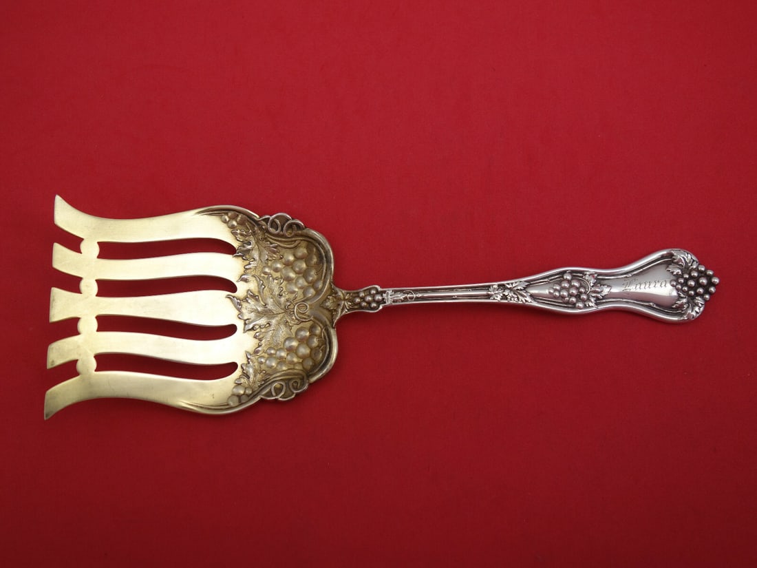 Dominick & Haff Grape Sterling Silver Asparagus Fork Goldwashed 9 1/4": Dominick & Haff Grape Sterling Silver Asparagus Fork Goldwashed 9 1/4" This exquisite asparagus fork is a stunning piece from the renowned Dominick & Haff, crafted between 1850 and 1899. Featuring the