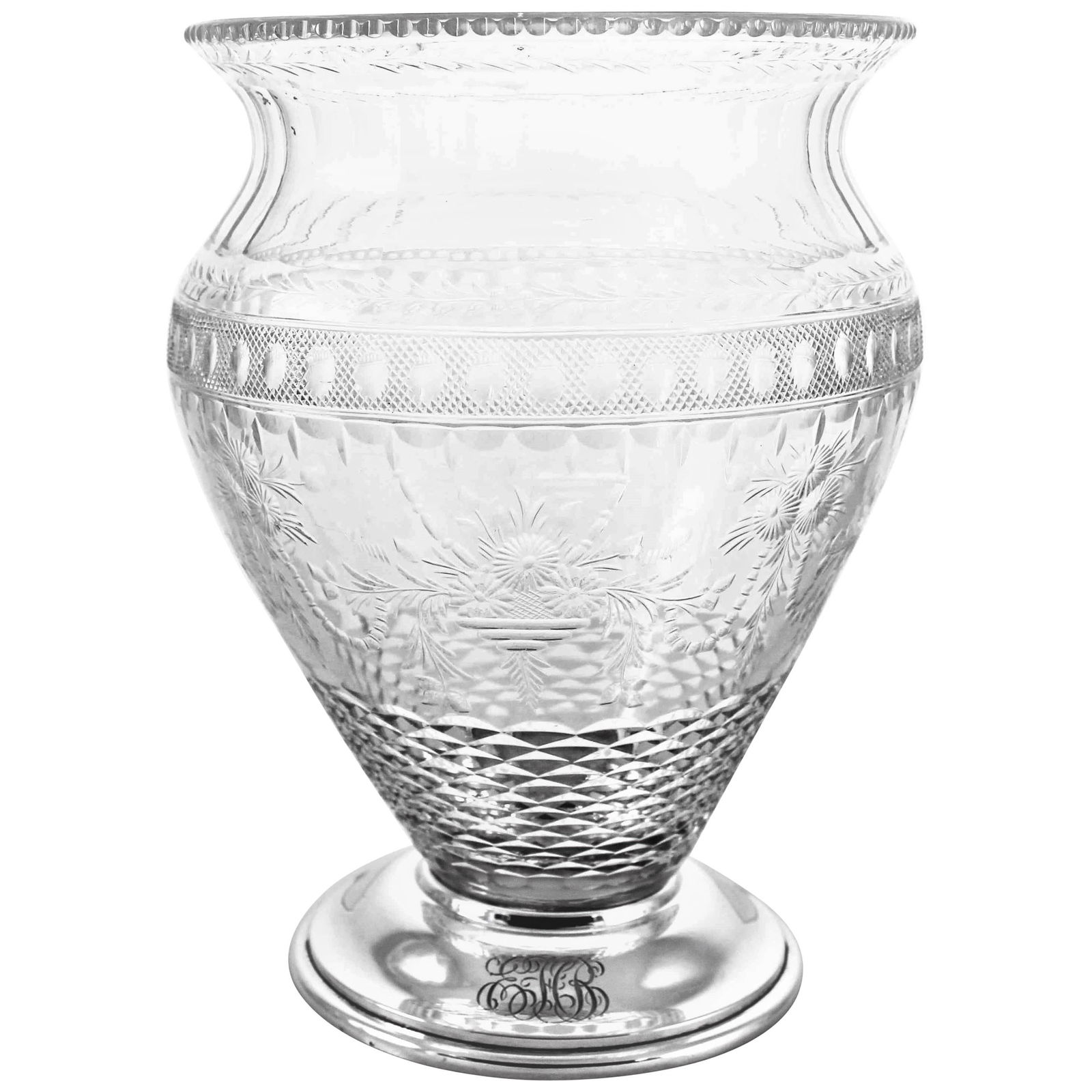 T.G. Hawkes Sterling Silver and Cut Glass Vase 6 in: T.G. Hawkes Sterling Silver and Cut Glass Vase 6 in This exquisite Hawkes Sterling Vase showcases the artistry of T.G. Hawkes & Co., renowned for their exceptional glass cutting techniques. Crafted ci