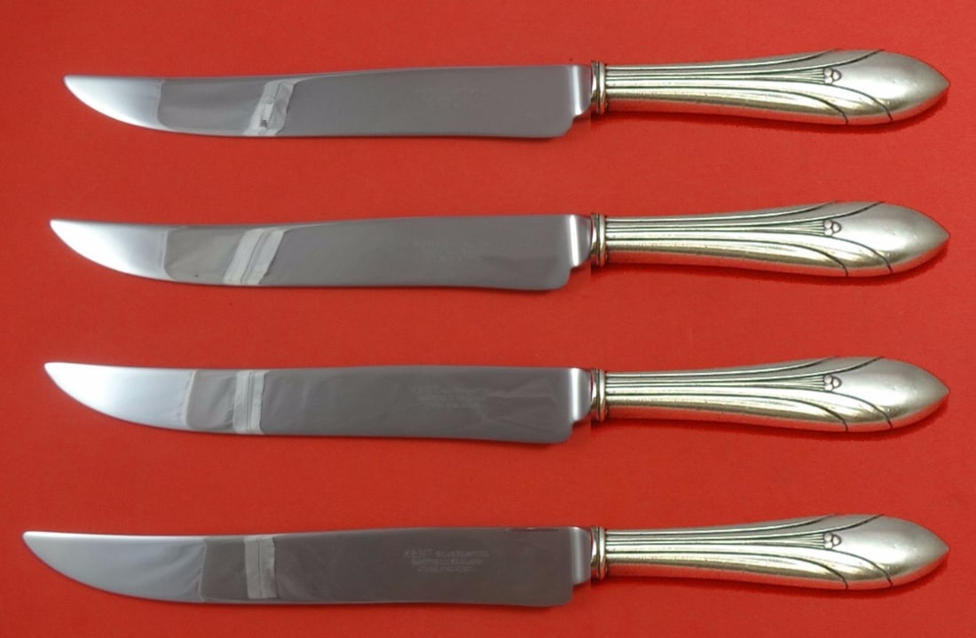 International Sterling Elsinore 4pc Texas Sized Steak Knife Set: International Sterling Elsinore 4pc Texas Sized Steak Knife Set Enhance your dining experience with this 4-piece steak knife set from the Elsinore pattern by International Sterling. Crafted from high-