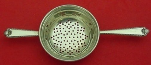Watson George II Rex Sterling Silver Tea Strainer 6 1/8: Watson George II Rex Sterling Silver Tea Strainer 6 1/8 This exquisite tea strainer features the distinguished George II Rex Hand Chased pattern by Watson. Crafted from high-quality sterling silver, t